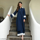 Navy blue rayon Pakistani-style kurta with palazzos, intricate lacework on collar, sleeves, and pant ends