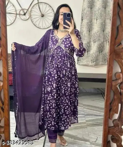 Women's floral printed rayon Aaliacut kurta, pant and dupatta set - three-quarter sleeves, vibrant Indian attire set on a mannequin