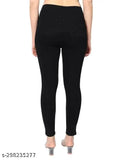 Black cotton blend girls' jeggings pack of 1 - women's high waist party wear jeans in solid black, available in sizes 24-32. Made in India