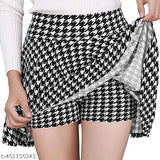 Cotton blend checked net skater skirt with attached inner shorts and flared inskirt. Multilayer waist with stretchable elastic band, mid-waist length, suitable for tall thin girls. Available sizes: 26, 28, 30, 32. Origin: India