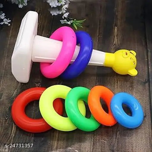 Multicolor plastic stacking ring set for newborn toddlers, featuring 7 rings and encouraging visual development with shapes and colors