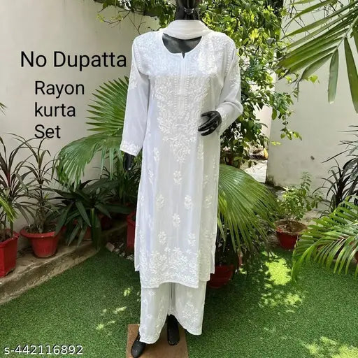 Rayon Chikankari print kurta set for couples, three-quarter sleeves, fully dyeable. Indian handcrafted traditional attire on mannequin