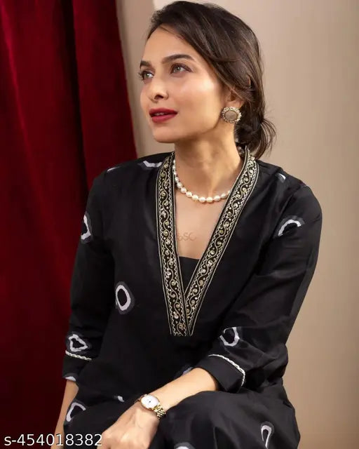 Trendy rayon kurti with embroidery, solid pattern, three-quarter sleeves. M size, bust 38in, length 48in. Made in India