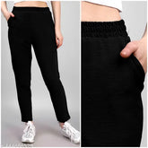 Black polycotton high-rise track pants, textured net, comfy fit for women's gymwear or casual wear. India origin