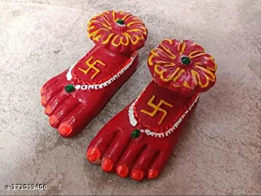 Red terracotta Laxmi Charan Paduka handicraft set, symbolizing prosperity and wealth for Diwali puja