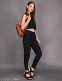 Black and white striped cotton jeggings for women, fashionable stretchable trousers on hanger