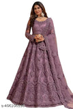 Indian designer net lehenga with embroidered zari thread, perfect for weddings. Free size with 44 inch waist and 44 inch length