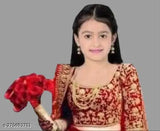 Red velvet lehenga choli with traditional embroidery, best for kids' party wear. High-quality velvet and net fabric