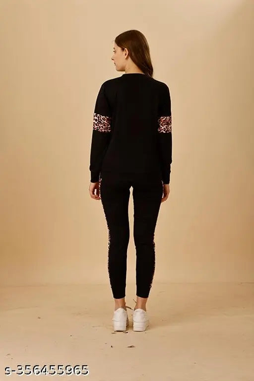 Black striped cotton blend women's track suit with long sleeves, leggings, and print pattern for summer activewear, gym wear, or yoga. Made in India