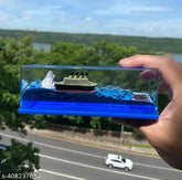 Unsinkable Titanic cruise ship model in liquid wave bottle, Chinese-made car display art