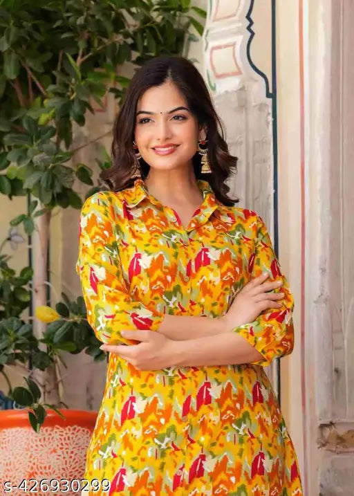 yellow rayon kurti plajo set with printed net palazzos, vibrant and stylish Indian fashion for women