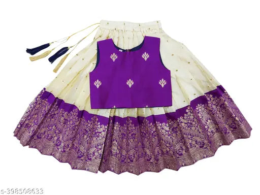 Cotton-silk, sleeveless girls Lehenga choli in traditional Kerala Kasavu design. Perfect for functions like Rice eating ceremony or Diwali