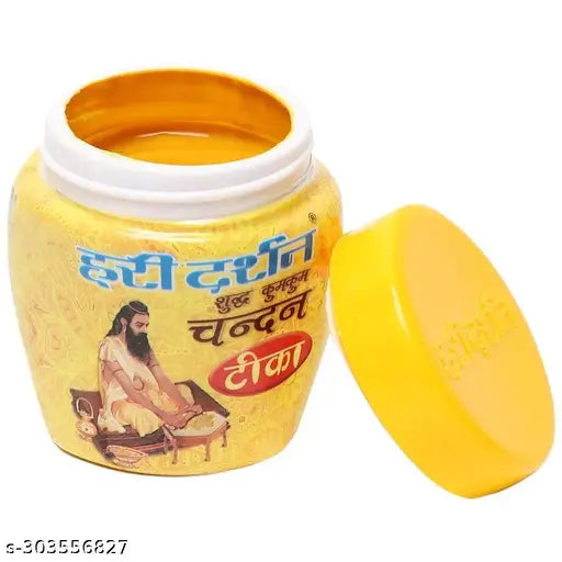 Hari Darshan Yellow Kumkum Chandan Tika Paste(40gm) - Pure sandalwood and kumkum paste for traditional Indian rituals & ceremonies, vibrant yellow color on display