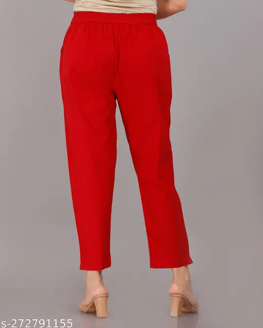 Cotton blend solid net women's pant, ideal for exploring fashion with 2 side pockets and tapered legs. Made in India