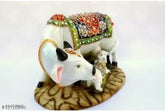 Multicolor Kamdhenu cow and calf statue, ornate polyresin showpiece for home decor, 10cm x 10cm x 10cm (India)