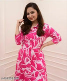 Pink Rayon Kurti Pant Set with Printed Net Pattern, suitable for Western Wear, Office wear, and Summer Wear. Full sleeve kurta set with an A Line straight fit and pants having a relaxed straight fit with ankle length