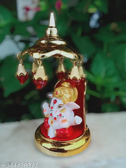Gold-plated marble Ganesha statue with umbrella stand, Hindu idol for car dashboard. High quality, detailed craftwork, made in India