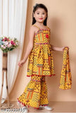 Yellow printed cotton blend palazzo pants set with sleeveless top & dupatta for girls - India, exquisite anarkali style coord set with knee-length top & print net dupatta