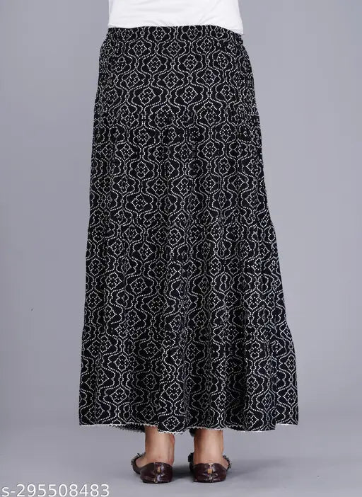 Black printed rayon long skirt for women, featuring a printed net pattern and available in multiple sizes from 34 to free size