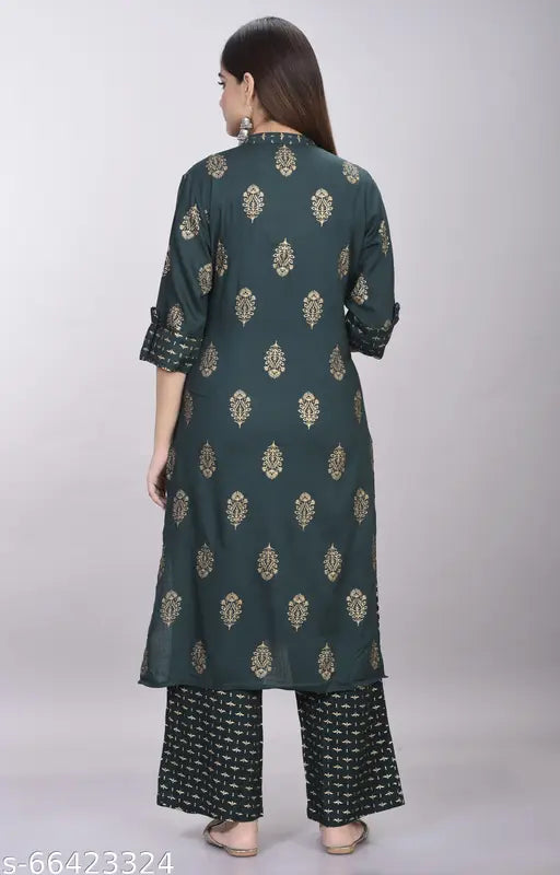 Stylish women's rayon kurta and palazzo set with printed net pattern, three-quarter sleeves. Perfect for functions, festivals, parties, or weddings. Made in India