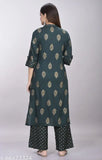Stylish women's rayon kurta and palazzo set with printed net pattern, three-quarter sleeves. Perfect for functions, festivals, parties, or weddings. Made in India