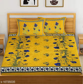 Yellow cotton Jaipuri flower printed double bed sheets & pillow covers, vibrant floral design for queen-sized beds from India