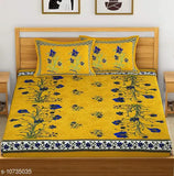 Yellow cotton Jaipuri flower printed double bed sheets & pillow covers, vibrant floral design for queen-sized beds from India