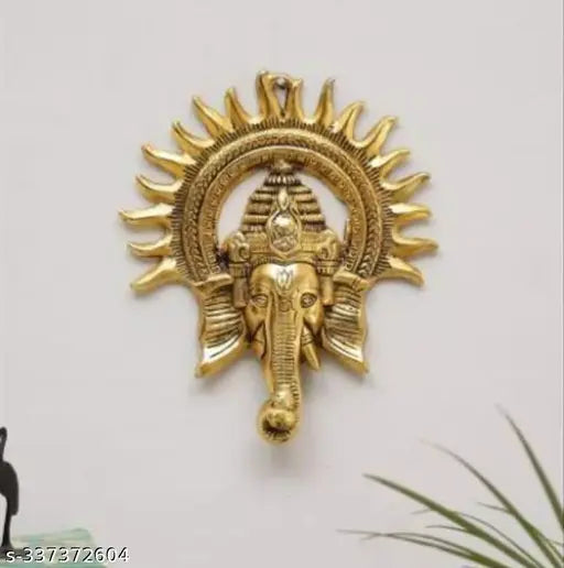Golden aluminum Ganesha wall hanging, intricately detailed Indian decorative showpiece - 28cm