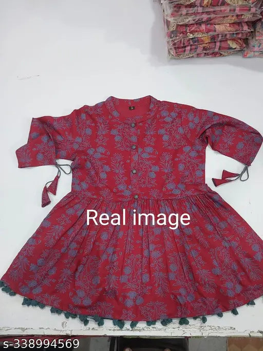 Rayon three-quarter sleeve printed short kurti for women, latest style party wear in vibrant prints
