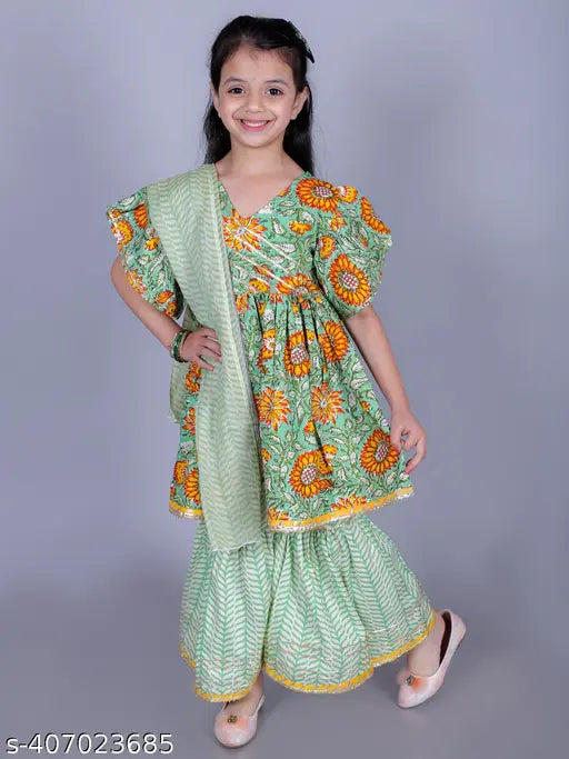 Green cotton floral print Anarkali/Flared Kurta, Sharara & Dupatta set for girls. 90% cotton, 10% polyester. Comfortable, casual wear with various sizes available: 18-24M (18in), 12-18M (16in), 3-4Y (22in), 4-5Y (24in), 5-6Y (26in), 6-7Y (28in), 7-8Y (30in), 9-10Y (32in), and 2-3Y (20in). Made in India