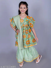 Green cotton floral print Anarkali/Flared Kurta Sharara & Dupatta set for girls. Soft, breathable, and comfortable clothing with 90% cotton, 10% polyester blend. Multiple sizes available: 4-5 Years (24in/24in), 5-6 Years (26in/26in), 3-4 Years (22in/22in), 18-24 Months (18in/18in), 12-18 Months (16in/16in), 6-7 Years (28in/28in), 7-8 Years (30in/30in), 9-10 Years (32in/32in), 2-3 Years (20in/20in). Origin: India