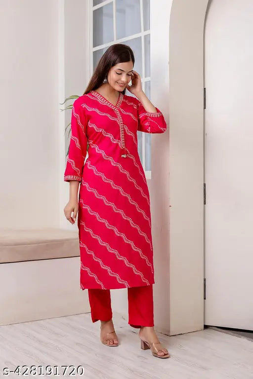 Rayon pink embroidered Leheriya print party kurta set with palazzos, detailed work on three-quarter sleeves
