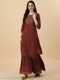 Burgundy kameez with flared skirt and long sleeves