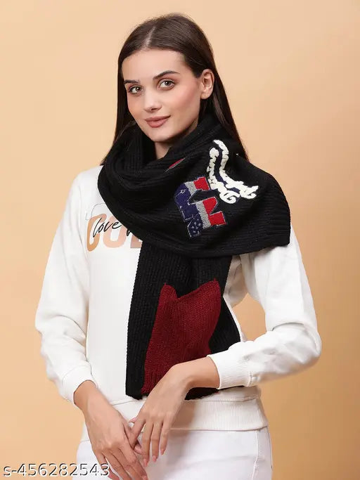 Black wool knitted muffler with embroidered patches, ideal for layered style and warm casual looks