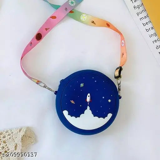 Rainbow printed canvas crossbody purse with push bubble feature, ideal for kids' toys and essentials. Adjustable shoulder strap. Made in India