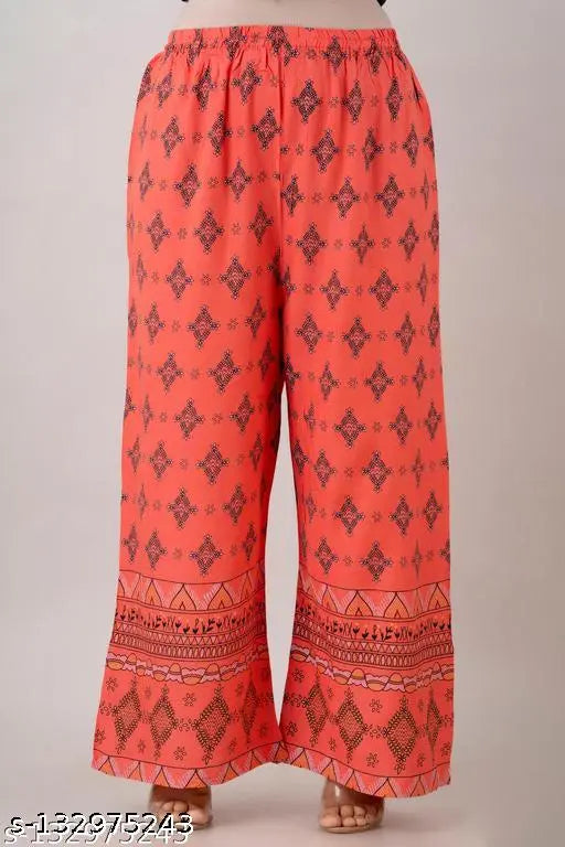 DarkGreen Rayon printed Kurta set with Palazzos, latest design by Zeenat Libaas. Traditional Indian women's clothing with three-quarter sleeves