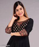 Designer Rayon Anarkali printed kurti, three-quarter sleeve, vibrant Indian fashion on mannequin