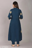 Printed rayon Anarkali Kurta set with rayon pants, three-quarter sleeves, vibrant Indian patterns on display. M: Bust 38", Bottom 39", L: Bust 40", Bottom 39", XL: Bust 42", Bottom 39", XXL: Bust 46", Bottom 39". Made in India