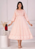 Baby pink rayon Anarkali kurta with buttis print and embroidery, three-quarter sleeve length, solid combo. Women's summer fashion from India