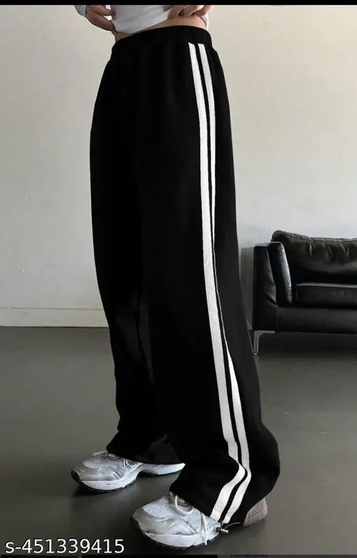 White cotton blend maxi Patti trousers, striped and elastic low waist, suitable for casual streetwear