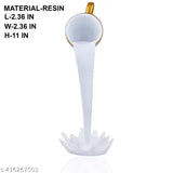 Antique resin floating cup showpiece for home decor, captivating and thoughtful table art. Handcrafted in India, adds a unique touch to living room or bedroom decor