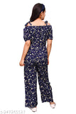 Cotton blend printed navy jumpsuit for girls trending ages 8-13, featuring floral design and shoulder straps. Indian origin