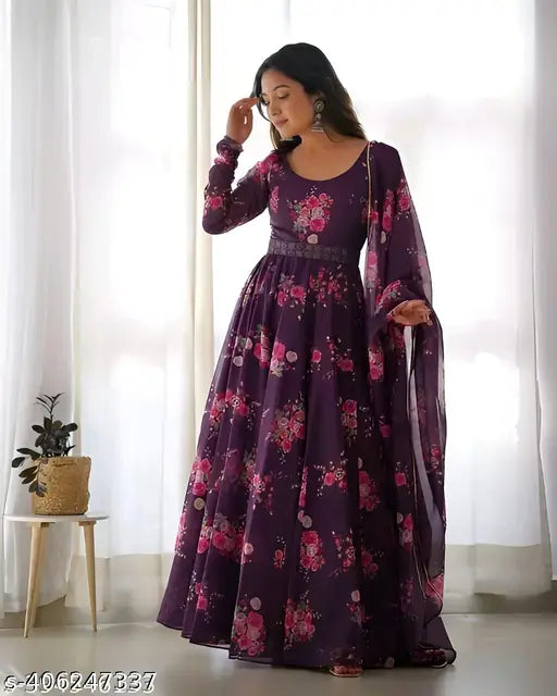 Trendy printed georgette gown set with long sleeves, available in sizes S-XXXXL. Indian handcrafted fashion on display rack