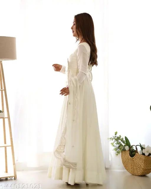 Premium quality romansilk chanderi anarkali dress with dupatta set, perfect for festive and wedding occasions. Solid colored full-length kurta with three-quarter sleeves, available in sizes XS to XXL
