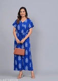 Blue rayon printed jumpsuit for women, short sleeves on fashion-forward model