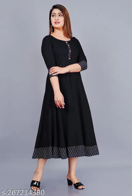 Stylist women's solid printed round pleated flared rayon kurti (Black), 3/4 sleeve, hand washable, suitable for casual and formal occasions, fits regular body type. Size: XS-XXXL, length: 48". May vary slightly due to lighting sources or monitor settings. Made in India