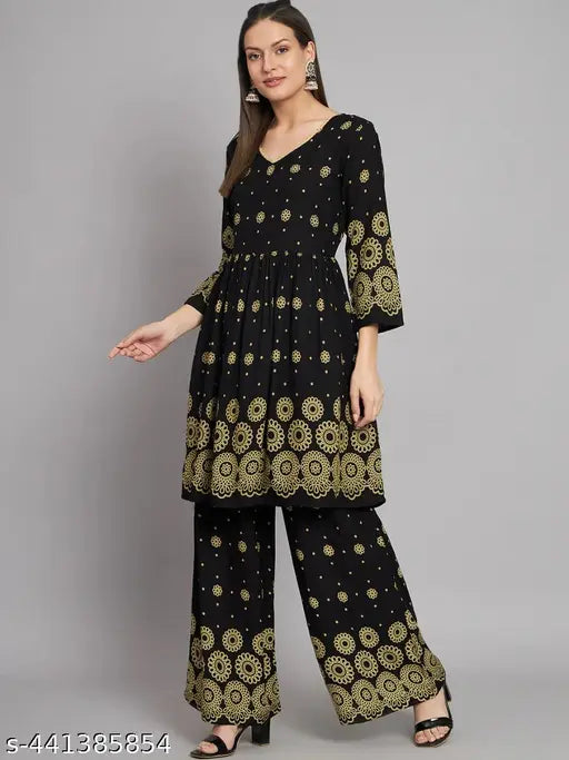 Floral print rayon A-Line kurta with palazzos, embroidered with adda, beads, and kantha work on calf-length straight design, suitable for casual/party wear for adult women