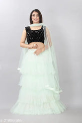 Light green velvet & net semi-stitched lehenga, sequinned choli, and lace dupatta - traditional Indian bridal wear