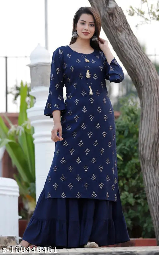 Blue printed rayon straight kurta and sharara set with three-quarter sleeves, rayon fabric for women, Indian traditional clothing on display