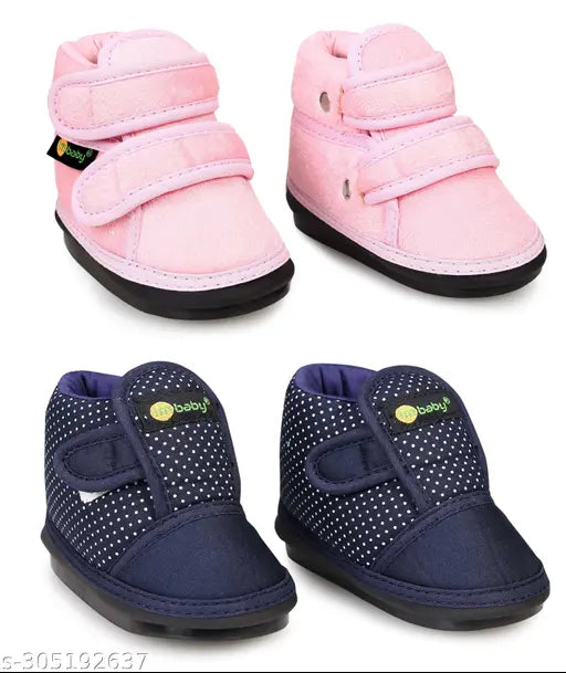 Pink and D.Blue textile and PVC casual boots for kids, featuring a chu-chu sound music mechanism and velcro fastening. Comfortable and skin-friendly shoes designed with maximum breathability and safety. Available in various sizes from 8 months to 2 years. Indian origin